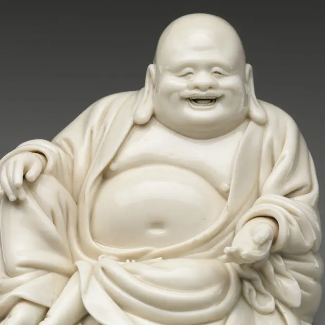 Porcelain ‘Laughing Buddha’ image, China, 17th-18th century. Metropolitan Museum of Art